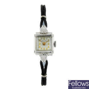 MARATHON - a lady's white metal wrist watch.