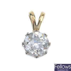 A gold diamond pendant. Known weight 3.01cts.