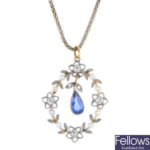 An early 20th century gold and platinum sapphire, diamond and seed pearl pendant.