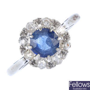 A mid 20th century 18ct gold and platinum sapphire and diamond cluster ring