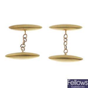 Two pairs of early 20th century 18ct gold torpedo cufflinks.