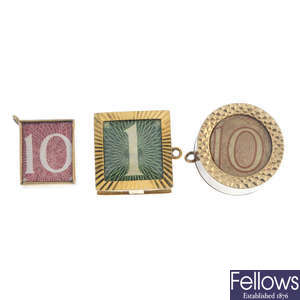A selection of seven 9ct gold note charms.