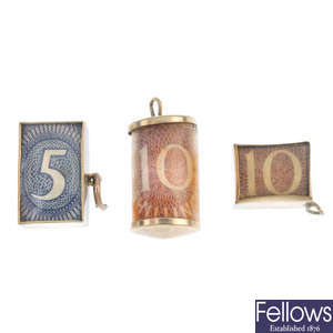 A selection of six 9ct gold note charms.