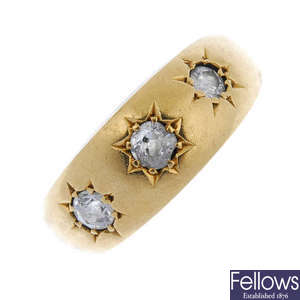 An early 20th century 18ct gold diamond three-stone ring. 