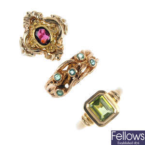 A selection of three gem-set rings.