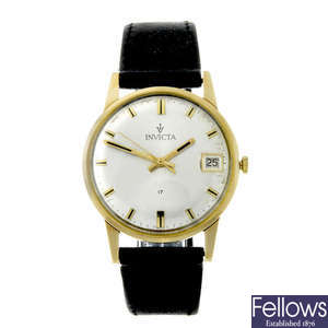 INVICTA - a gentleman's 9ct yellow gold wrist watch.