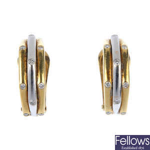 A pair of diamond bi-colour ear clips. 