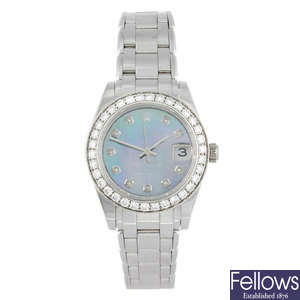 
ROLEX - a lady's 18ct white gold Oyster Perpetual Datejust bracelet watch.
