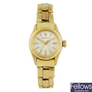 ROLEX - a lady's yellow metal Oyster Perpetual bracelet watch.