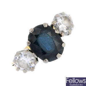 A sapphire and diamond three-stone ring. 