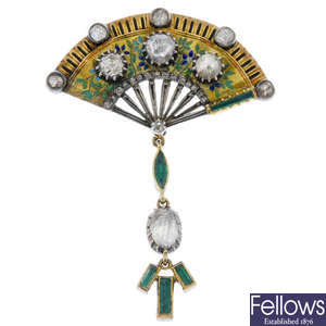 A diamond, emerald and enamel fan brooch. 