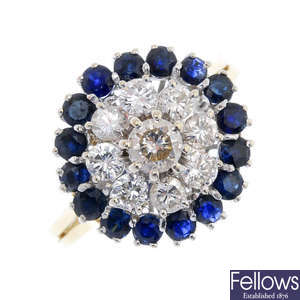 An 18ct gold diamond and sapphire cluster ring.