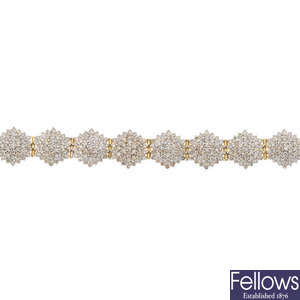 An 18ct gold diamond cluster bracelet. 
