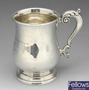 A 1930's silver 'hunting' mug.