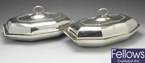 A pair of George III silver entree dish covers with later matched bases.