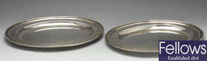 A pair of 1930's silver platters.
