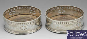 A pair of George III silver wine coasters, Samuel Godbehere 1785.