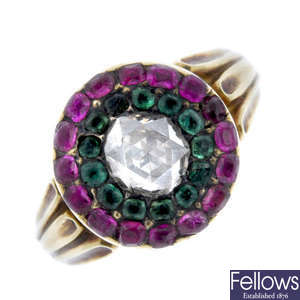 A late 19th century gold diamond, ruby and emerald cluster ring.