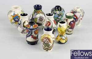 A group of ten Moorcroft modern miniature vases. 