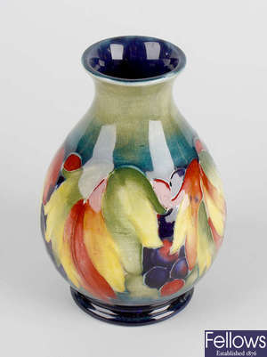 A small Moorcroft leaf and berry vase. 
