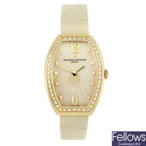 VACHERON CONSTANTIN - a lady's factory diamond set 18ct yellow gold Egerie wrist watch.