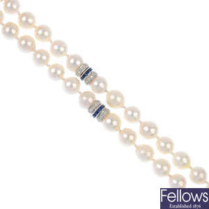 A cultured pearl single-strand necklace, with sapphire and diamond accents.
