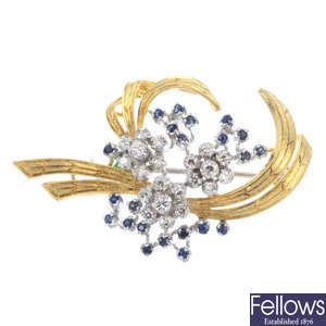 An 18ct gold sapphire and diamond floral spray brooch. 