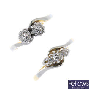 Two mid 20th century platinum and 18ct gold diamond crossover rings.