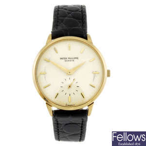 PATEK PHILIPPE - a gentleman's 18ct yellow gold Calatrava wrist watch.