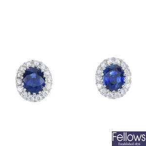 A pair of sapphire and diamond cluster ear studs.
