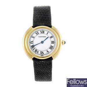 CARTIER - a yellow metal Ellipse wrist watch.