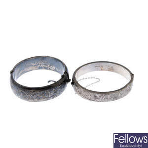 A selection of silver and white metal bangles.