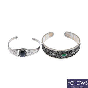A selection of silver and white metal bangles.