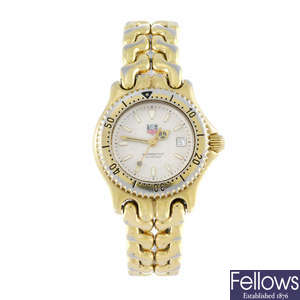 TAG HEUER - a lady's gold plated S/el bracelet watch.