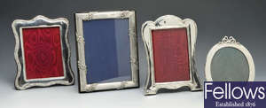 A group of four Edwardian and early twentieth century silver mounted photograph frames.