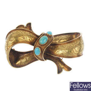 A late 19th century gold turquoise bow brooch.