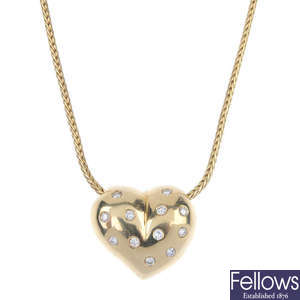 A diamond heart pendant, with necklace.