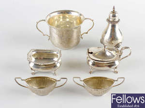A selection of late Victorian and Edwardian condiments and silver items. 