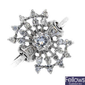 A diamond cluster ring. 