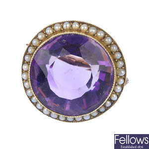 A late 19th century 9ct gold amethyst and split pearl cluster brooch.