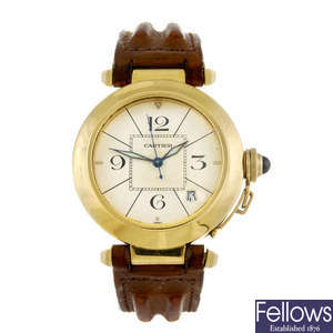 CARTIER - a yellow metal Pasha De Cartier wrist watch.