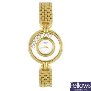 CHOPARD - a lady's 18ct yellow gold Happy Diamonds bracelet watch.