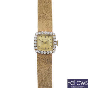 BUECHE GIROD - a 1960s 9ct gold diamond manual wind wristwatch. 