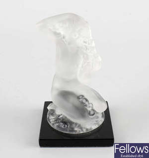 A modern frosted glass figure. 