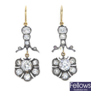 A pair of diamond cluster ear pendants. 