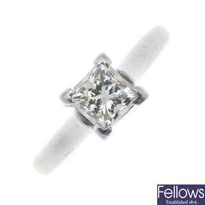 A platinum diamond single-stone ring. 