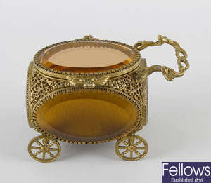 An early 19th century gilt metal and glass jewellery casket. 
