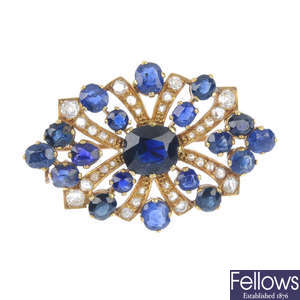 A gold sapphire and diamond brooch.