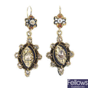 A pair of gold diamond and enamel dropper earrings.