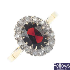 An 18ct gold diamond and garnet cluster ring.